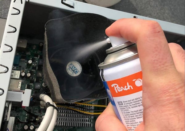 Air spraying an old and dusty fan