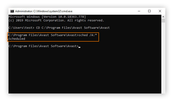 Scheduling a Boot-time Scan for Avast Free Antivirus within the Command Prompt interface of Windows 10 Safe Mode.